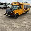 yellow 2013 GMC 18 Passenger