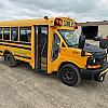 yellow 2013 GMC 18 Passenger