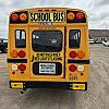 yellow 2013 GMC 18 Passenger